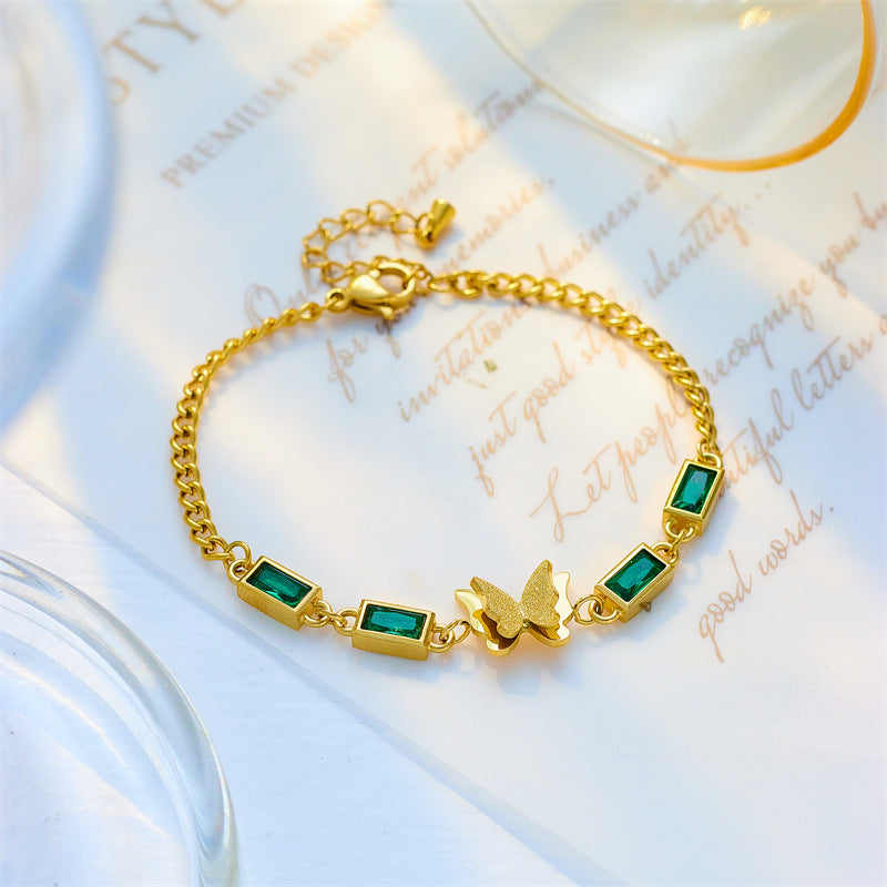 Bracciale vintage minimalista da donna in acciaio al titanio con farfalla quadrata e strass verdi