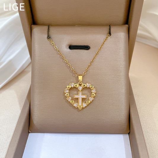 Collana con ciondolo a croce e cuore minimalista in acciaio al titanio con intarsio di strass per donna e unisex