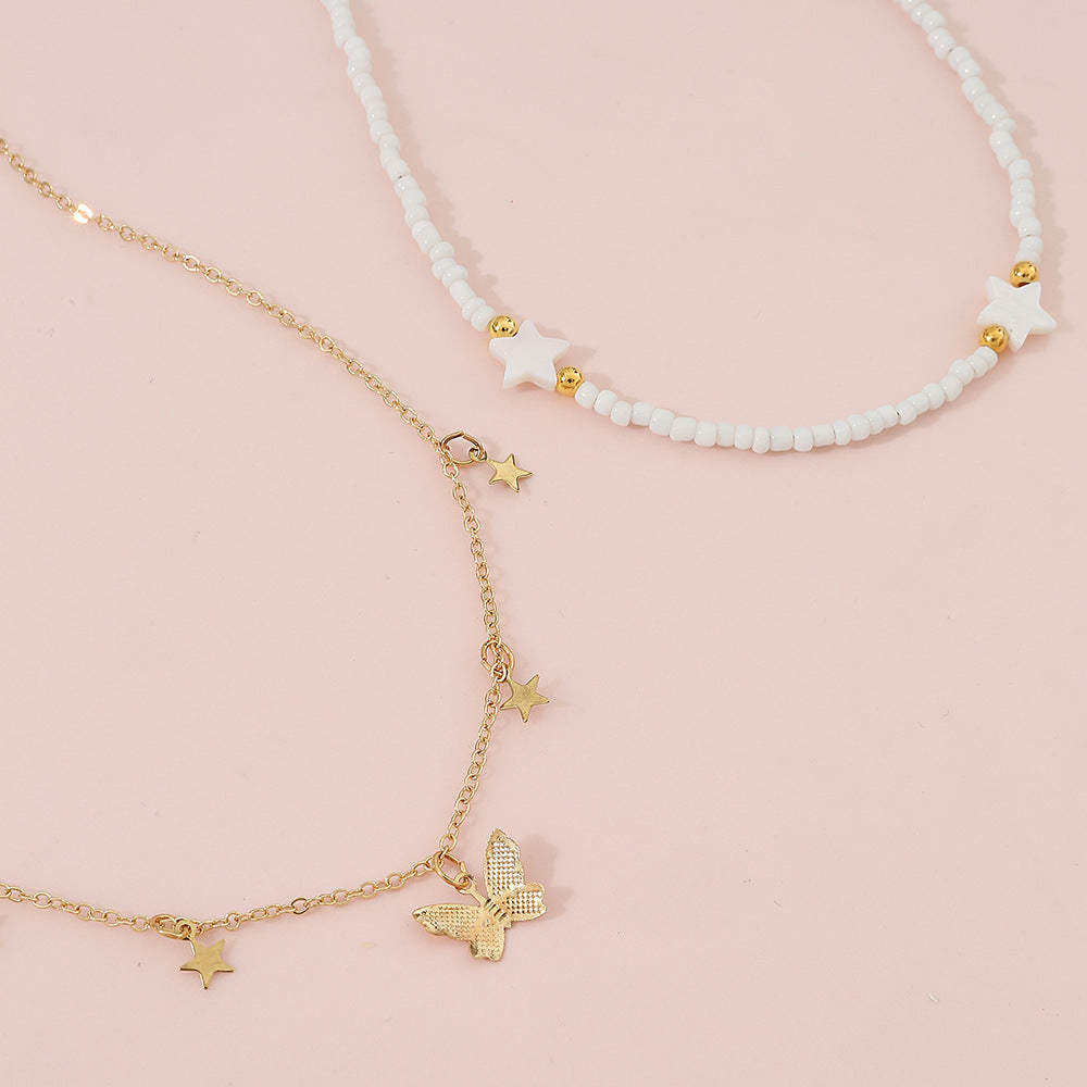 Set di collane in lega a forma di stella minimalista per bambine con catena di perline rotonde e finitura artigianale