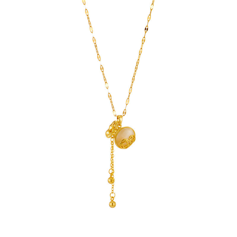 Collana con pendente a moneta con occhio di gatto geometrico e nappe su catena ondulata in acciaio inossidabile con placcatura in oro