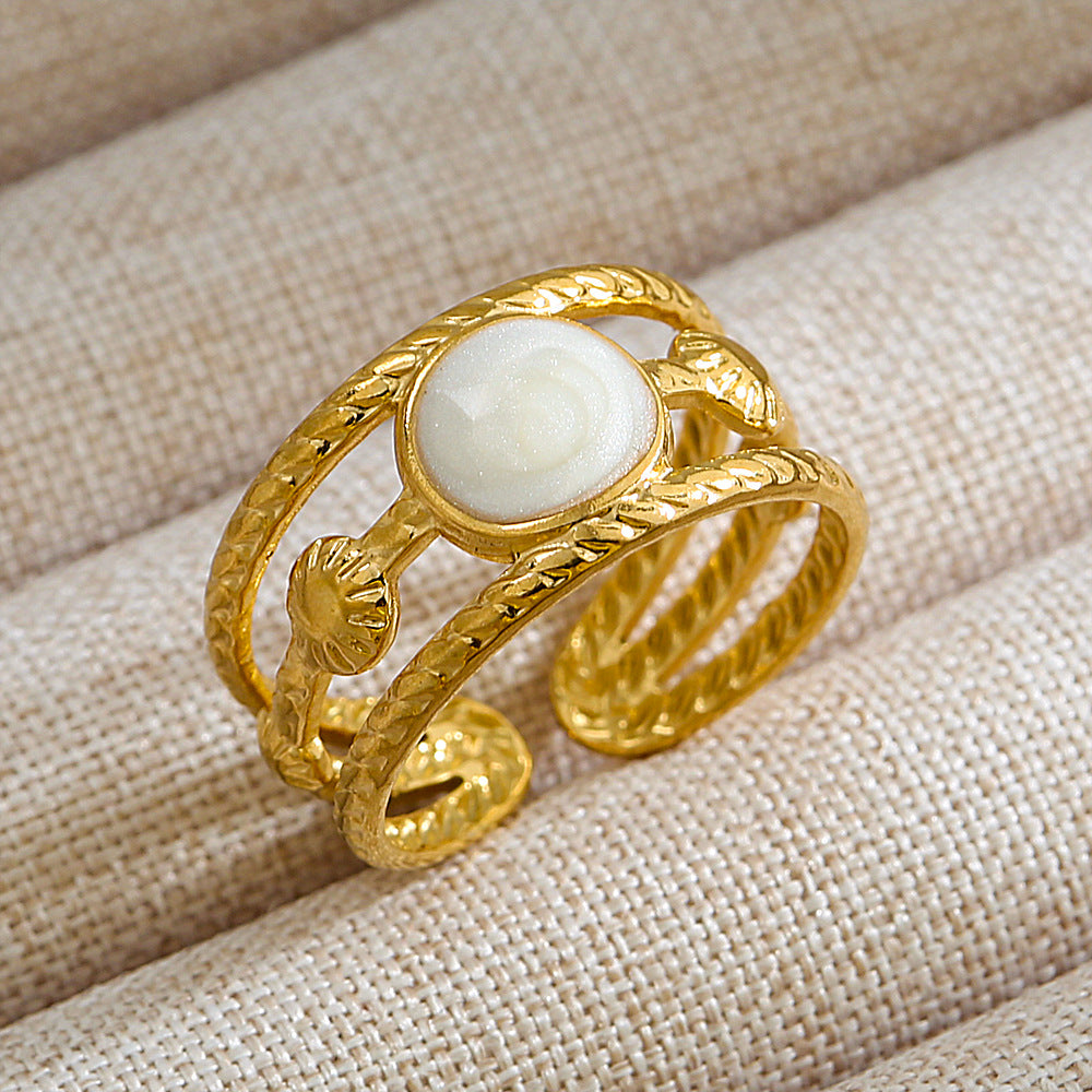 Anillo de acero de titanio con forma de U, estilo punk, chapado en oro de 18 quilates y detalles de microincrustaciones de piedra de lava ovalada