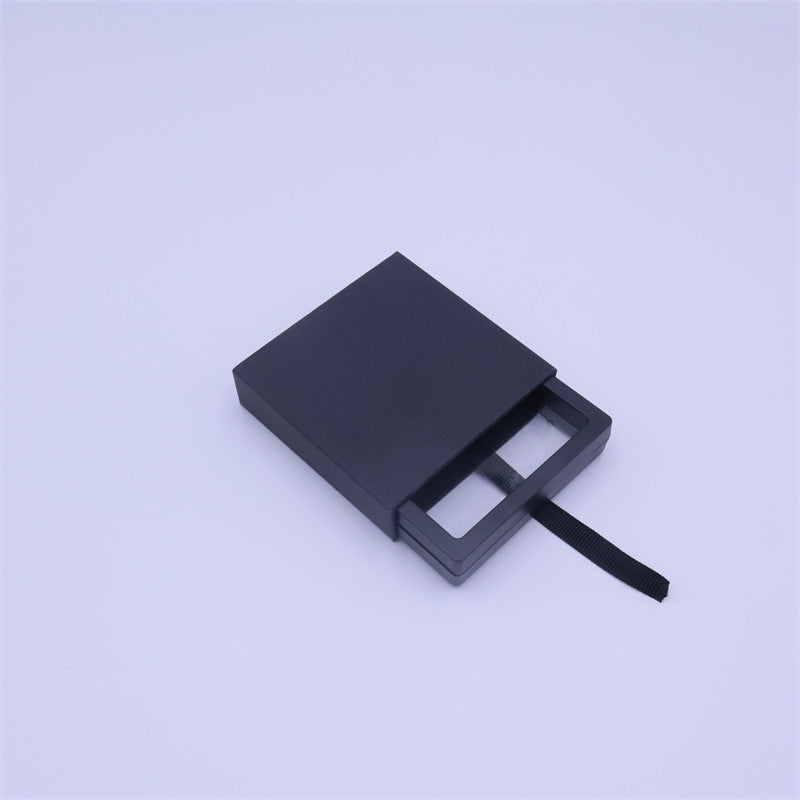 Scatola portagioie minimalista in carta nera con coperchio sollevabile per orecchini, bracciali, anelli e collane