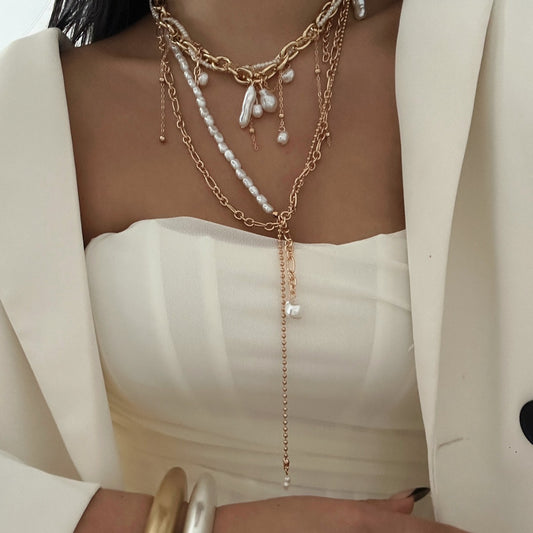 Collar en Y asimétrico informal de lujo con lágrima de aleación chapada, perla barroca y borla para mujer