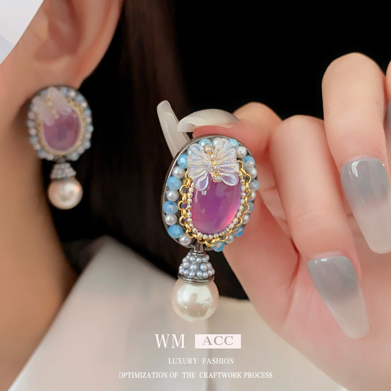 Orecchini a farfalla vintage in resina con cristalli e perle su base in lega placcata argento da donna