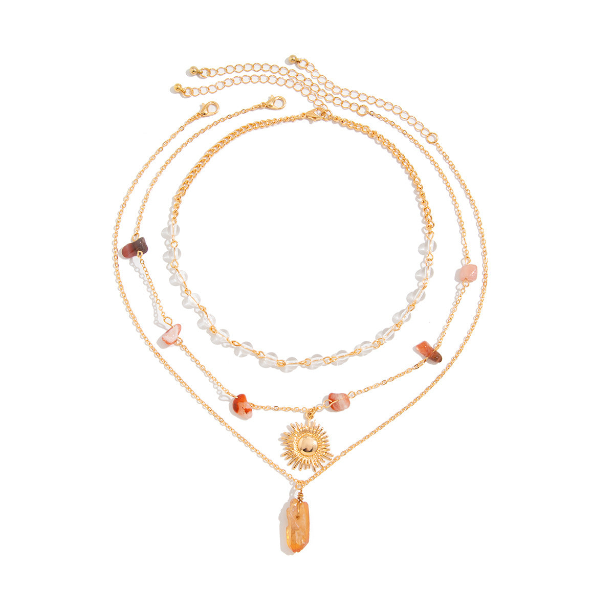 Collana con ciondolo a sole geometrico irregolare da donna con intarsi in turchese e cristallo su catena in rame e acciaio placcato con design a strati a nappa