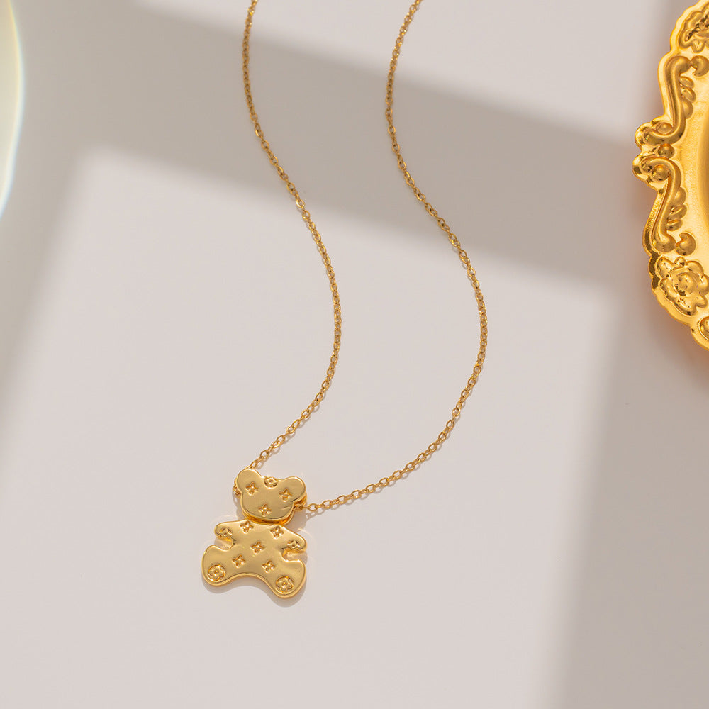 Graziosa collana con ciondolo a forma di orsetto animato da donna in acciaio al titanio con finitura placcata, design geometrico minimalista e catena per clavicola