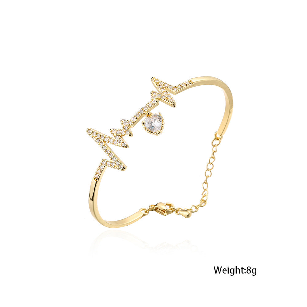 Gold Plated Brass Heartbeat Bracelet with Cubic Zirconia Inlay