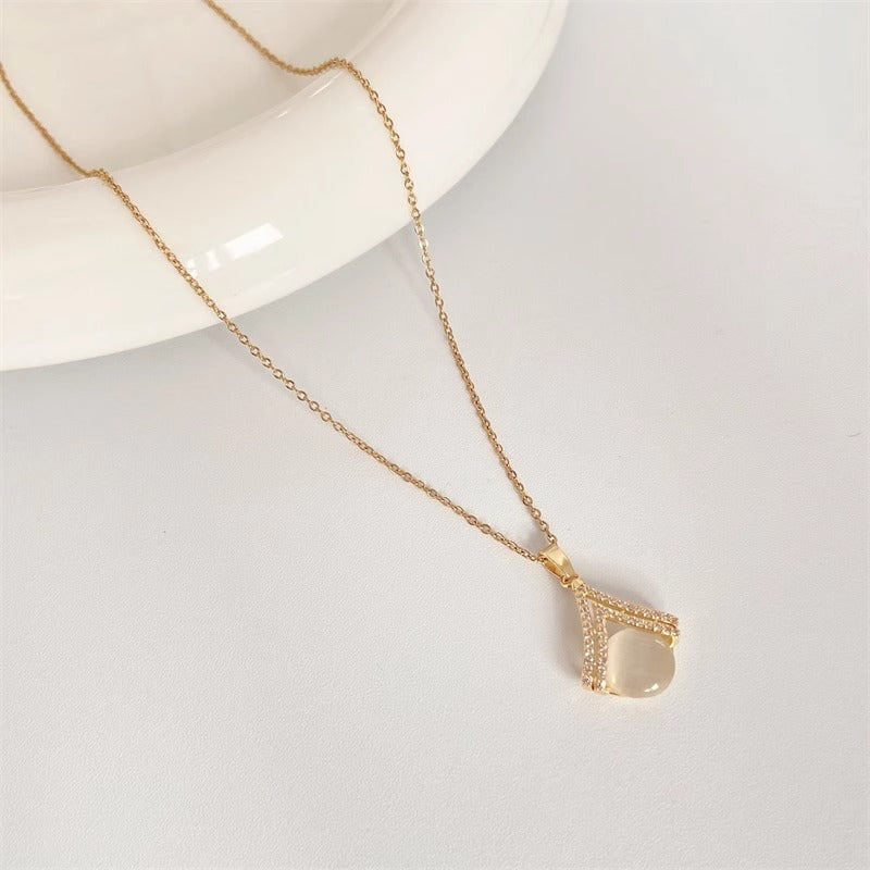 Collana con Ciondolo Occhio di Gatto Floreale dal Design Originale in Acciaio al Titanio con Finitura Placcata su Catena a O per Donna e Unisex