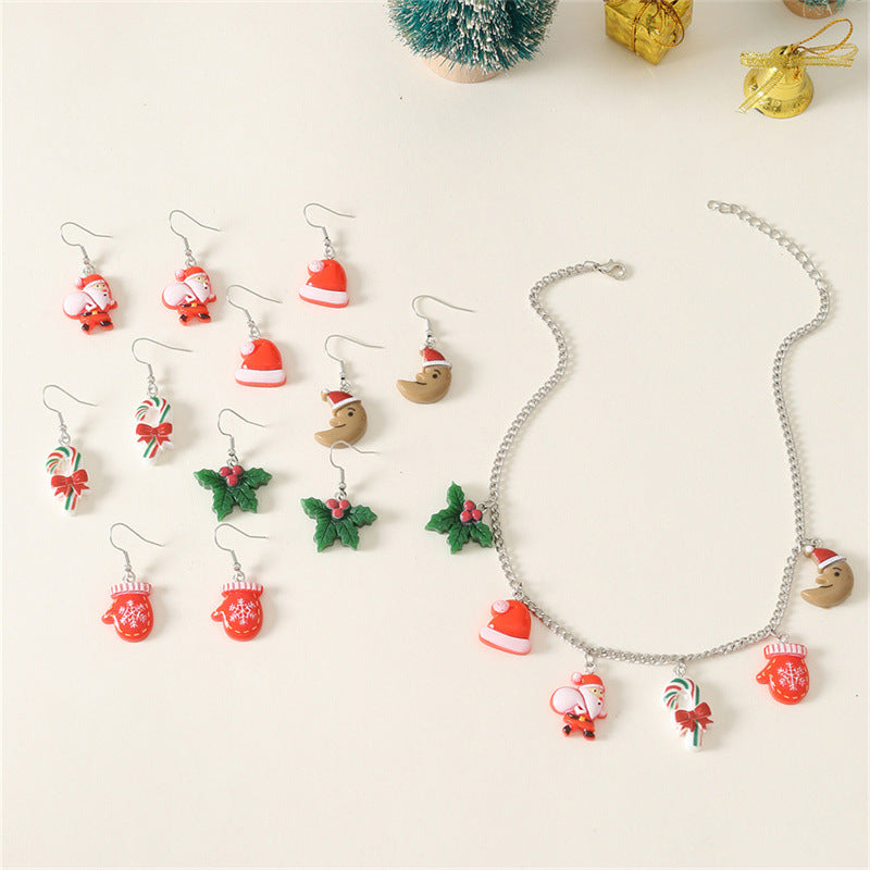 Set di collana e orecchini a tema natalizio con ciondolo di Babbo Natale in metallo e design a cappello di Babbo Natale per bambini