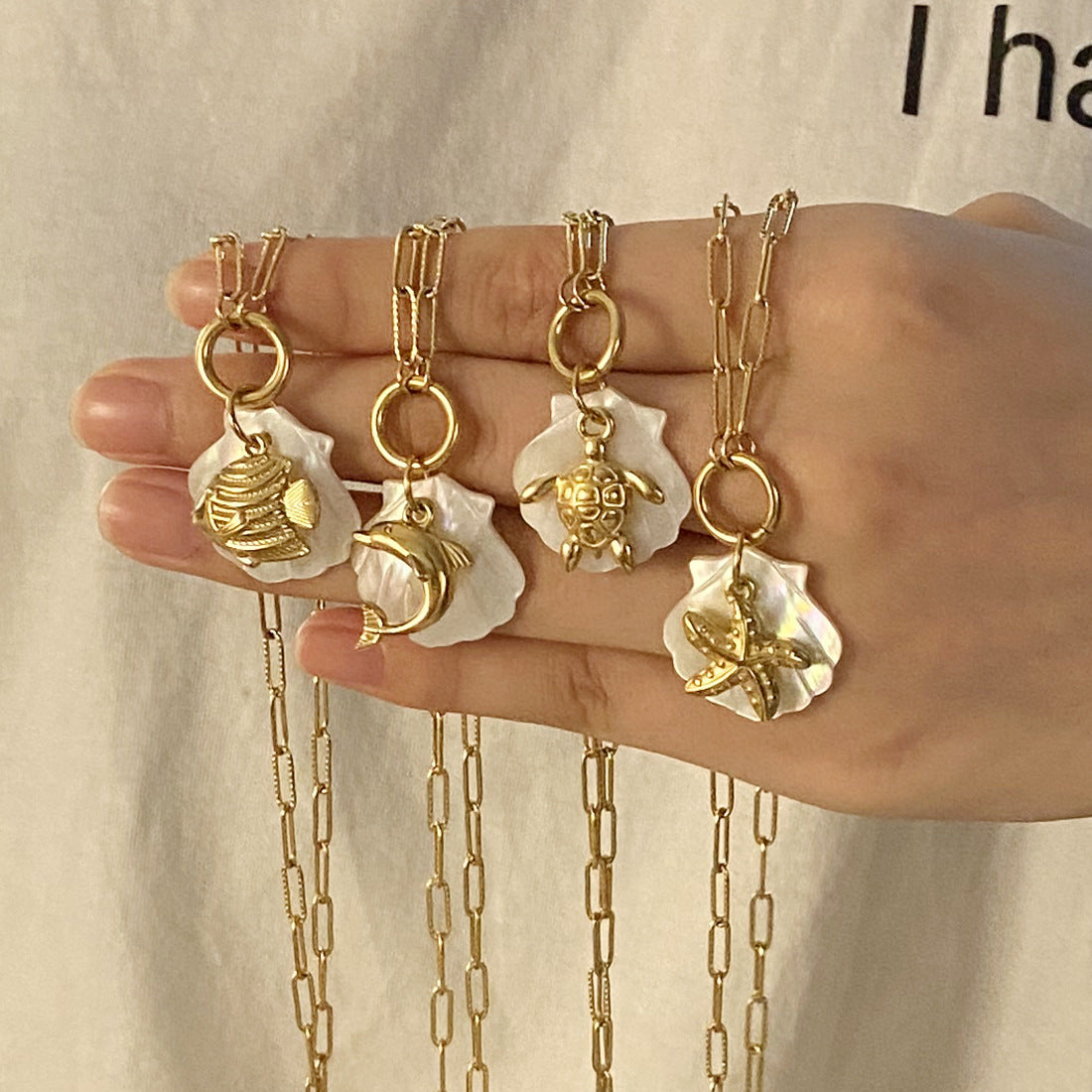 Collana con Pendente Personalizzata a Forma di Stella Marina e Delfino in Acciaio Inossidabile con Finitura Placcata per Donna