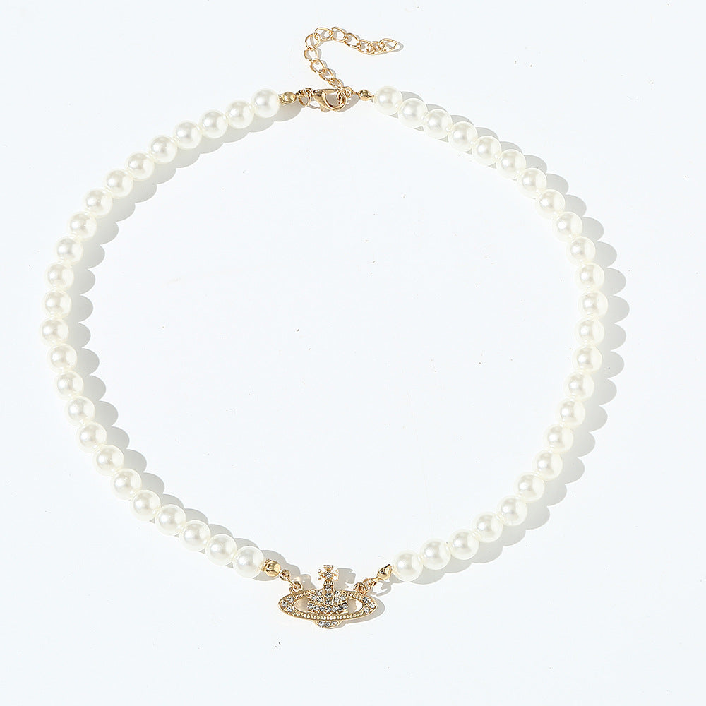Collar minimalista de resina estilo perla para niñas con cadena de cuentas redondas y dije de aleación tono dorado