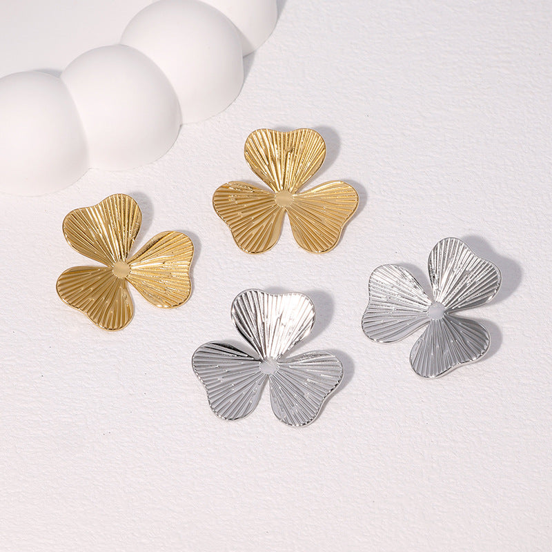 Orecchini a perno floreali minimalisti in acciaio inossidabile da donna con placcatura in oro, design unico e sobrio