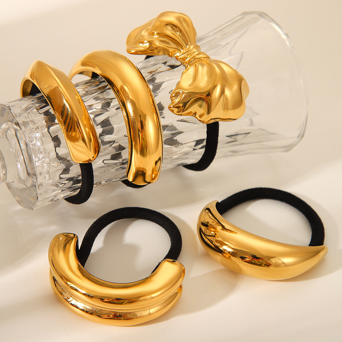 Fascia per capelli con fiocco curvo in acciaio inossidabile placcato oro 18K in stile Ins alla moda