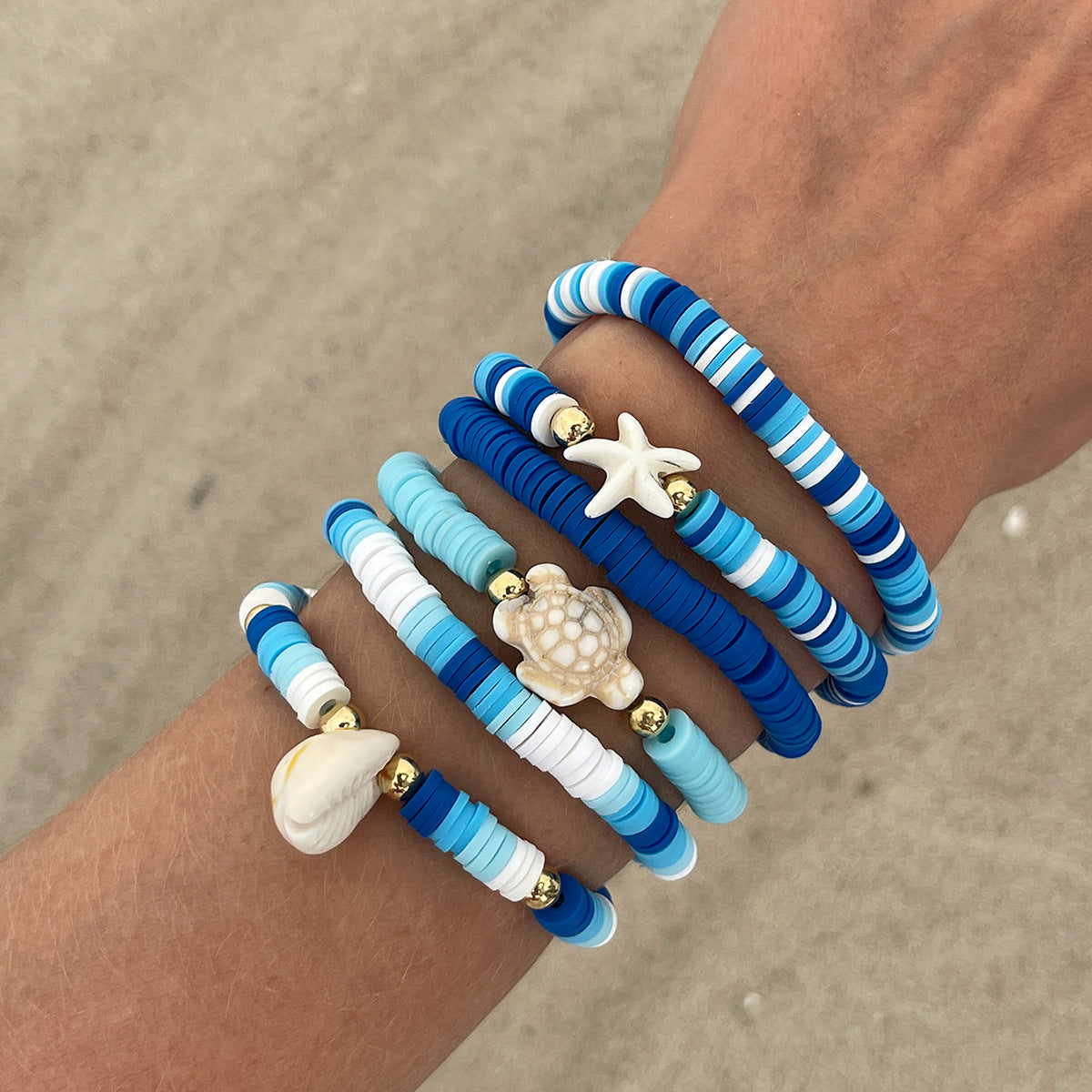 Set di bracciali in argilla polimerica a forma di fiore, in stile bohémien da spiaggia, con perline colorate e lavorazione artigianale