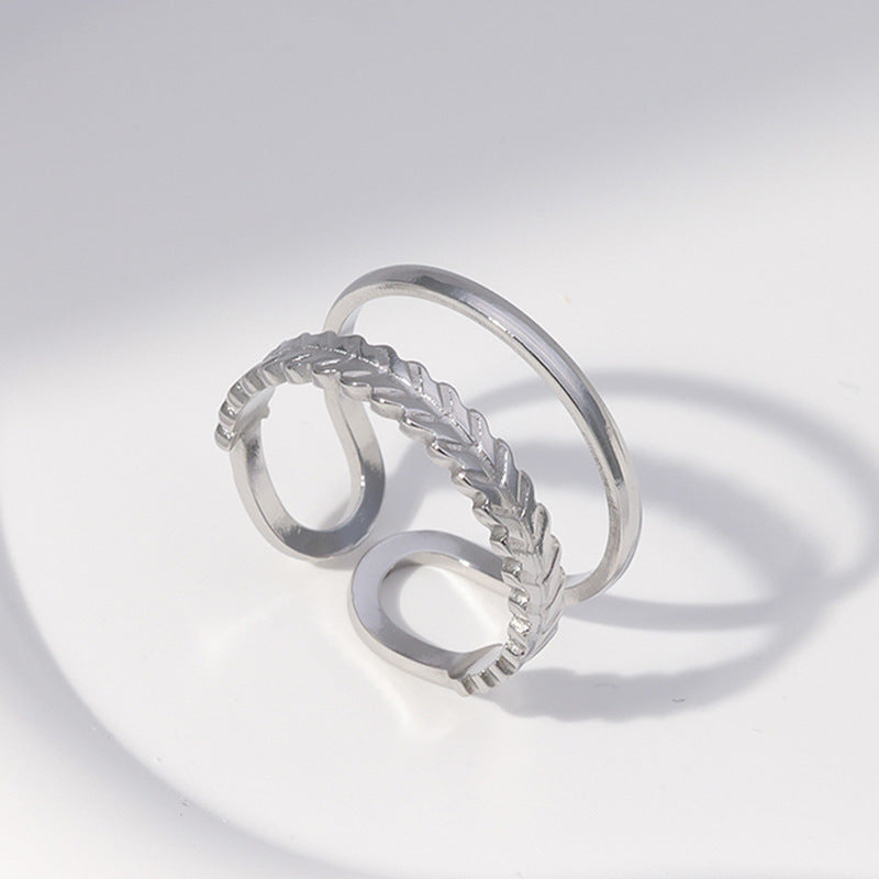 Anello aperto in acciaio inossidabile a forma di foglia minimalista da donna con finitura placcata