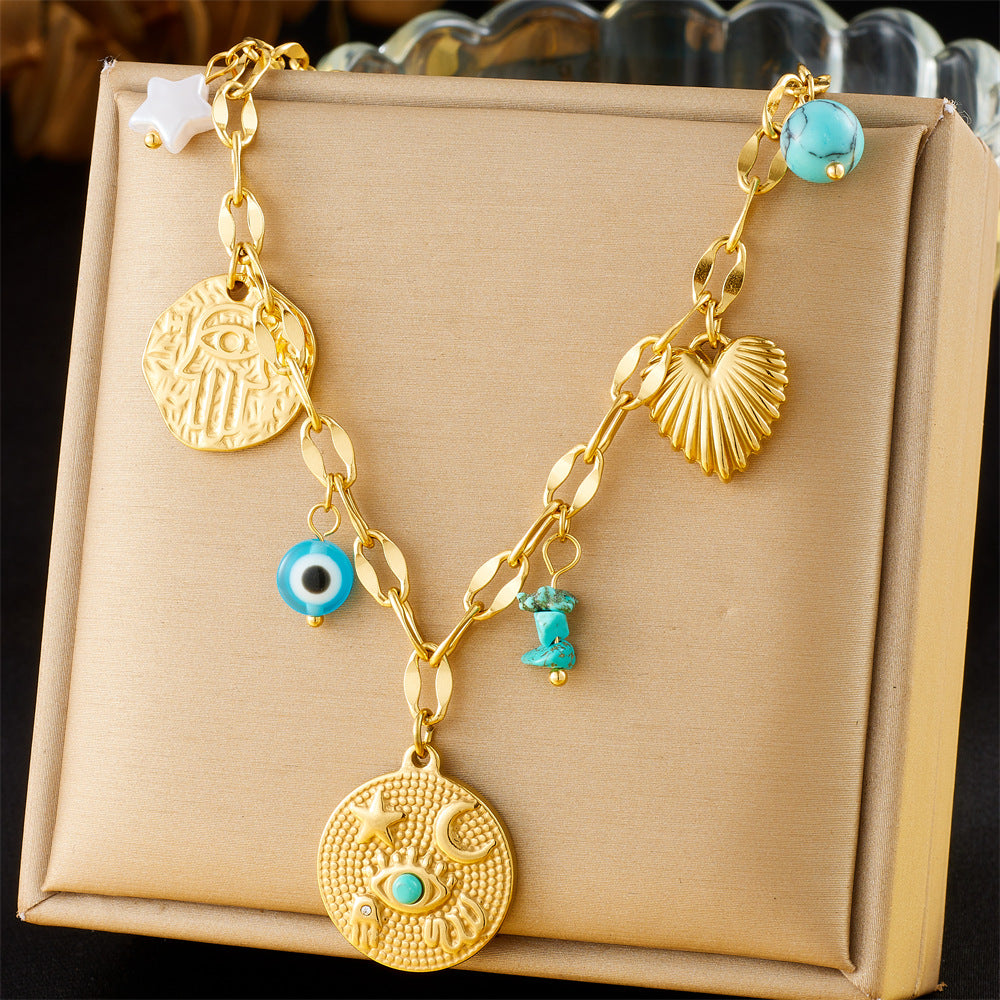 Collana con ciondolo a stella e cuore in stile vintage con intarsio in strass blu su catena a serpente in acciaio inossidabile da donna