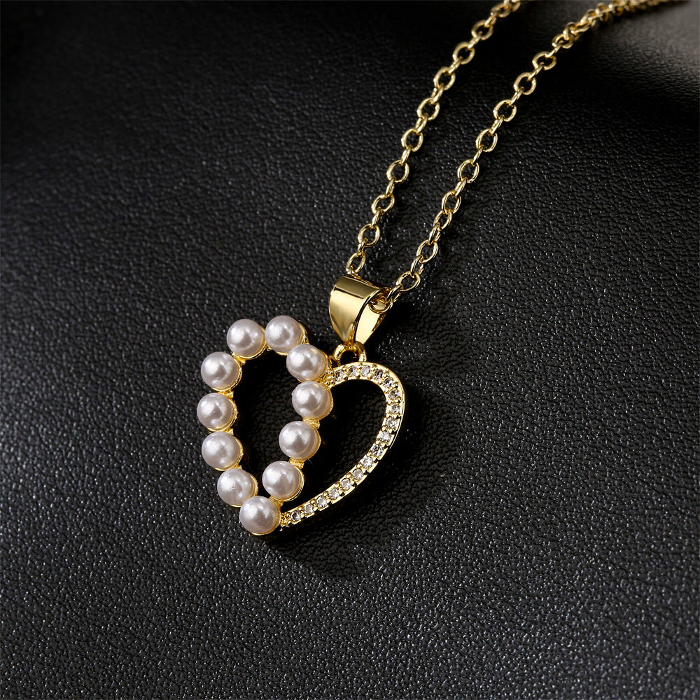 Collana con ciondolo a cuore vuoto minimalista in rame placcato oro 18K e intarsio di zirconi