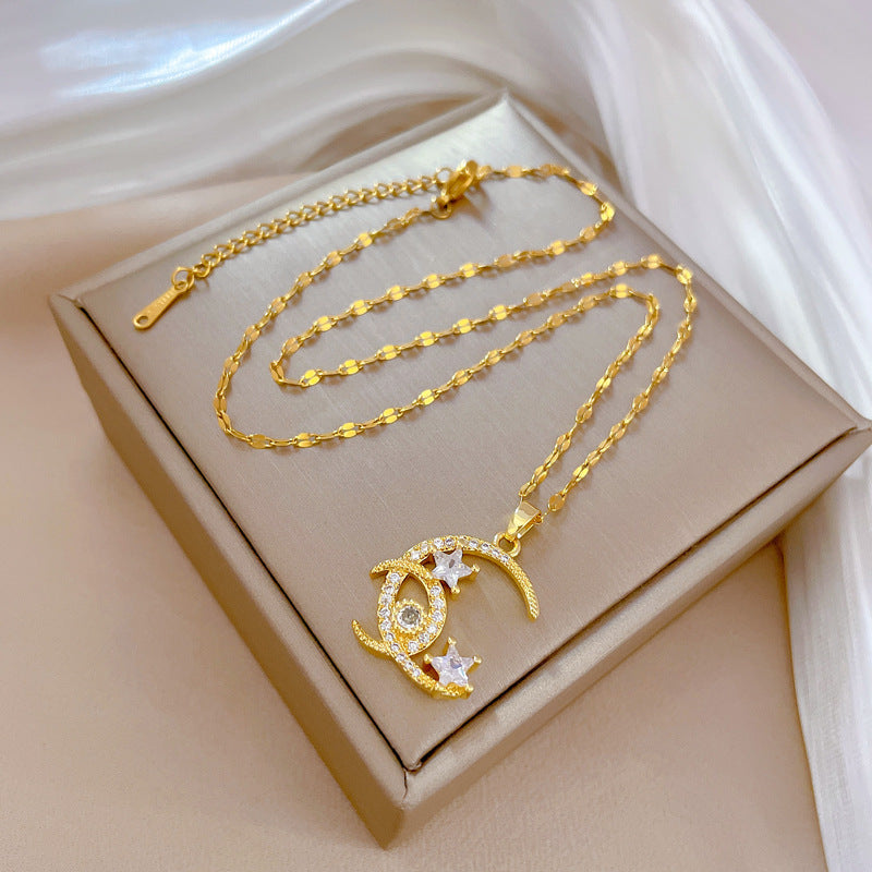 Collana con ciondolo a luna e stella geometrica in acciaio al titanio di lusso da donna