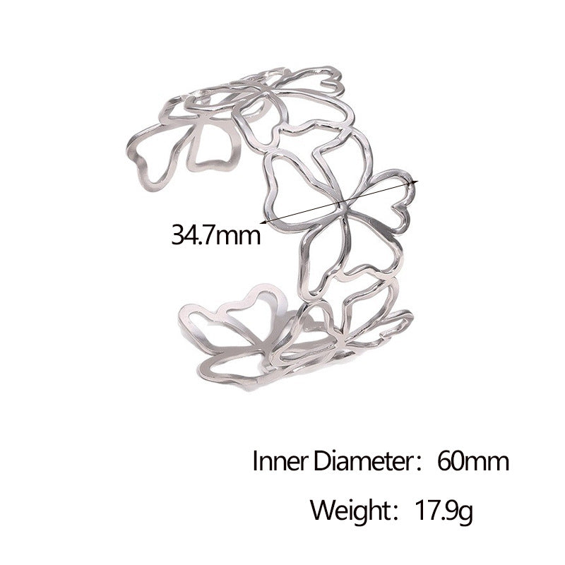 Bracciale a Polsino Aperto Minimalista in Acciaio Inossidabile Placcato Oro 18K con Design Floreale Intagliato