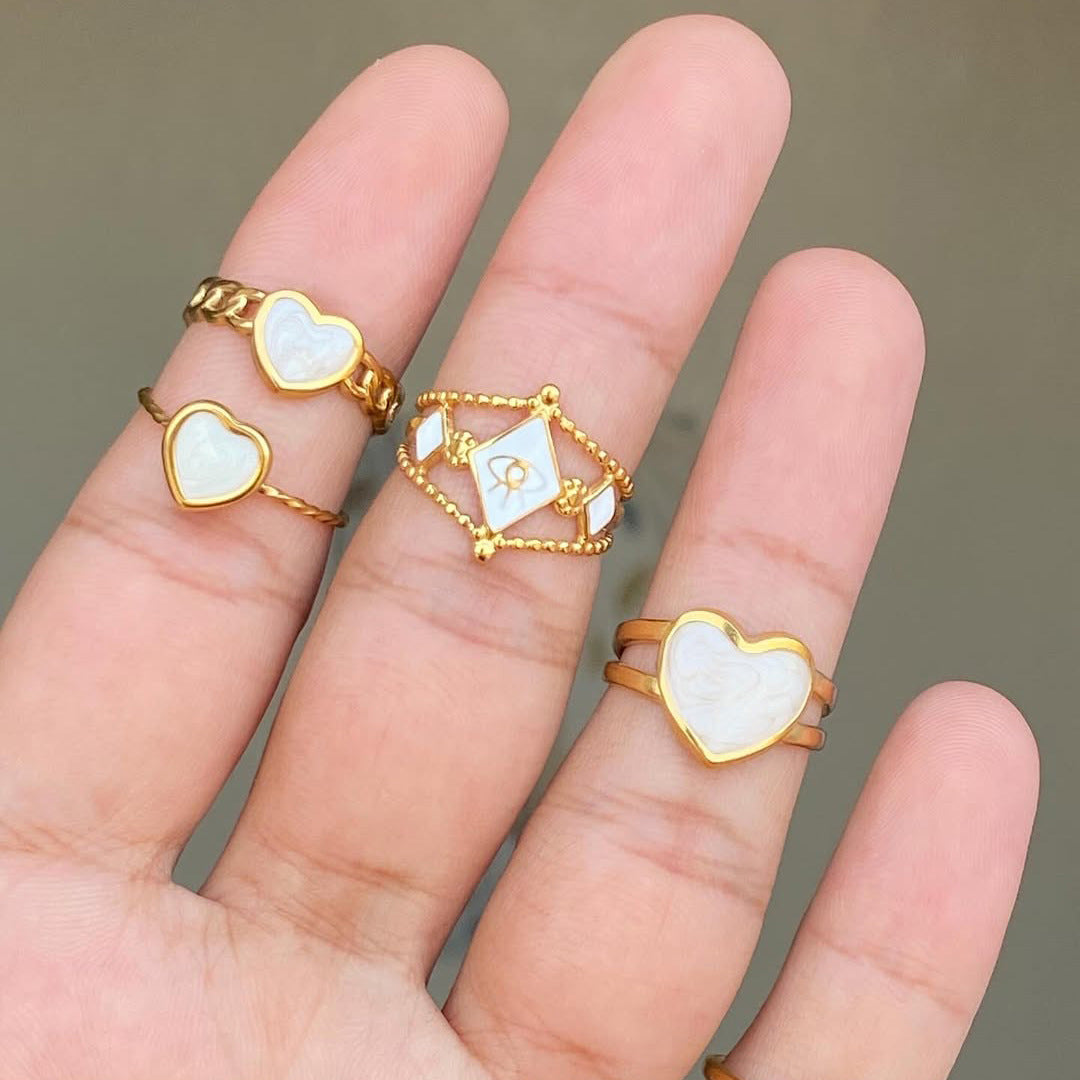 Anello aperto da donna in acciaio inossidabile con placcatura in oro, design geometrico a forma di cuore e ottagramma, stile moda pendolare