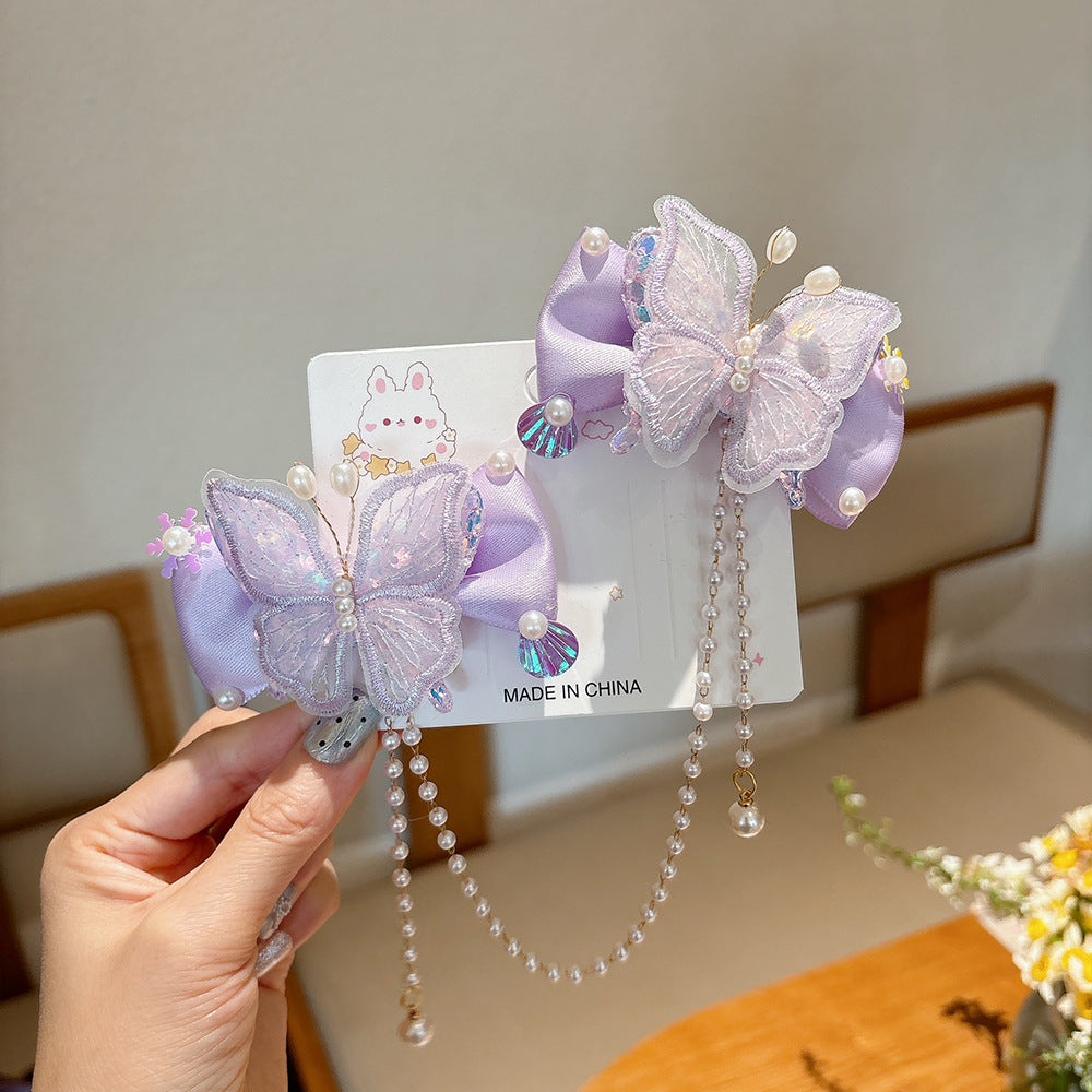 Lindos clips de pelo con diseño de mariposa estilo princesa para niñas con detalles de perlas y borlas, diseño de lazo de tela, set de pinzas laterales hecho a mano para niñas