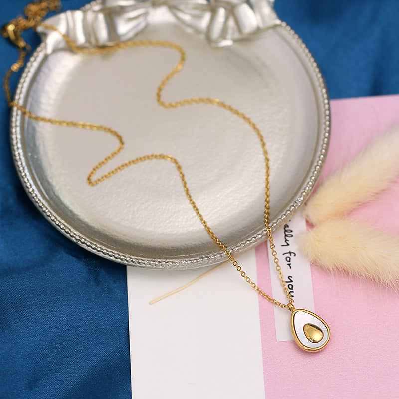 Minimalist Avocado Shell Pendant Necklace for Women in Titanium Steel with Gold Plating on Cross Chain