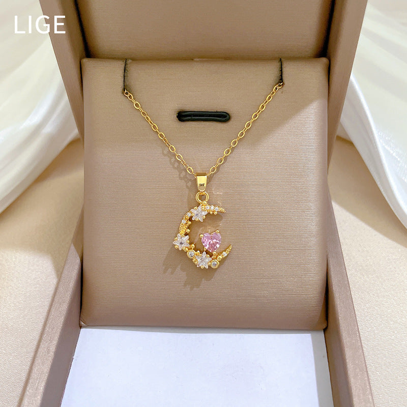 Collar con colgante de lujo de acero de titanio dulce y fresco con forma de corazón, estrella y luna de diamantes de imitación para unisex