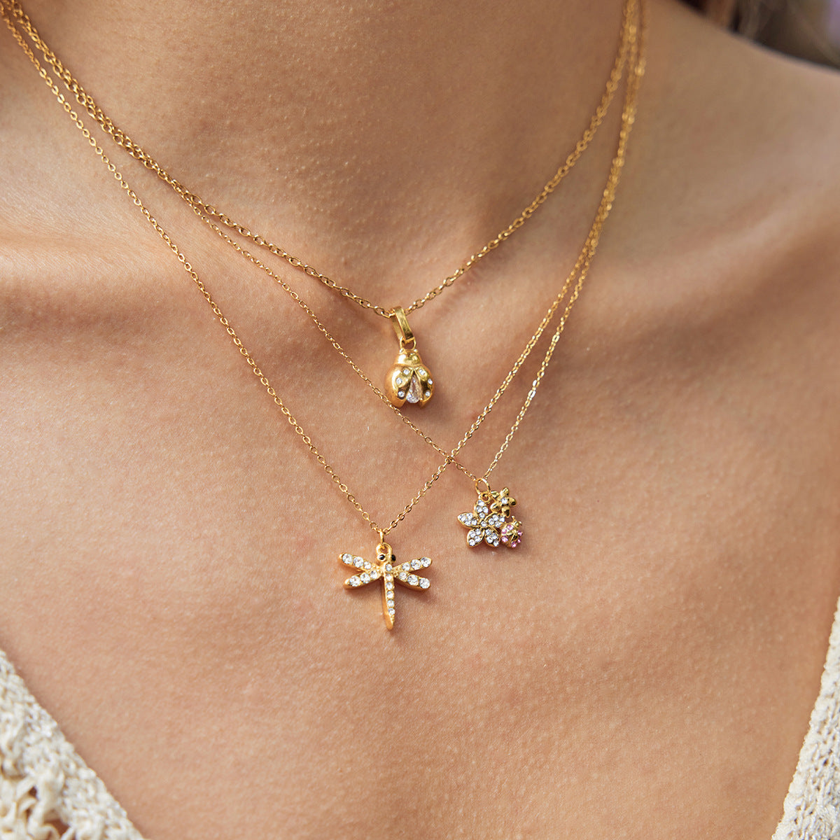 Collana pendente geometrica in acciaio al titanio con finitura placcata da donna, catena leggera di lusso per maglione