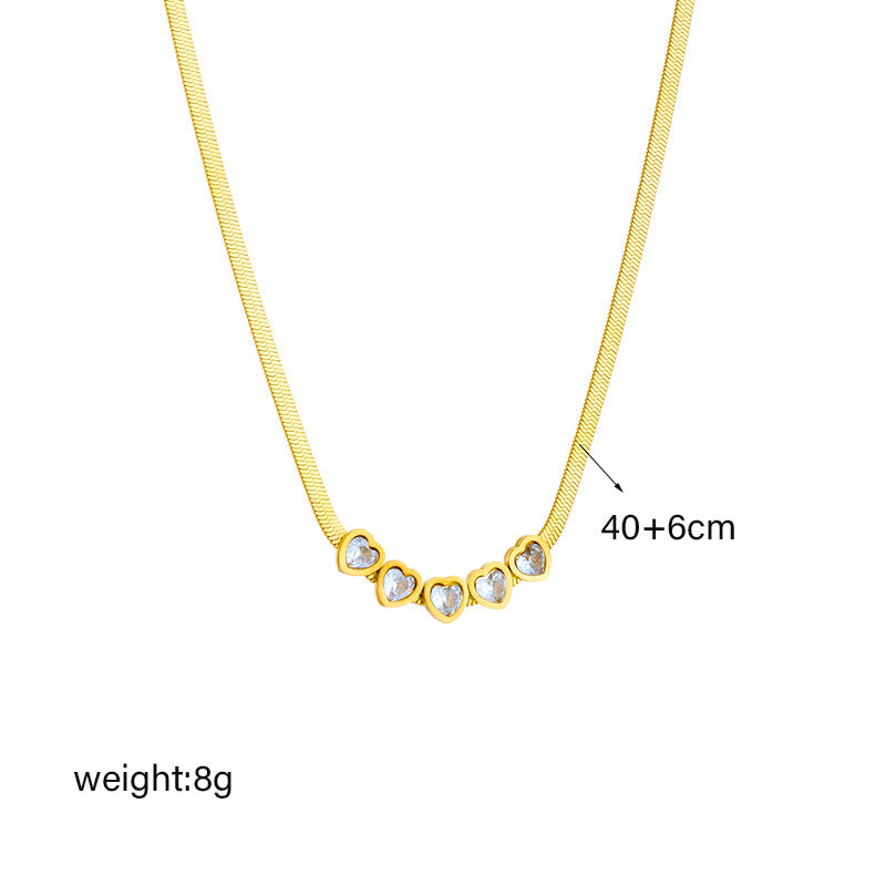 Juego de collar y pulsera minimalistas de acero de titanio con forma de corazón y cadena de serpiente con detalles de pedrería