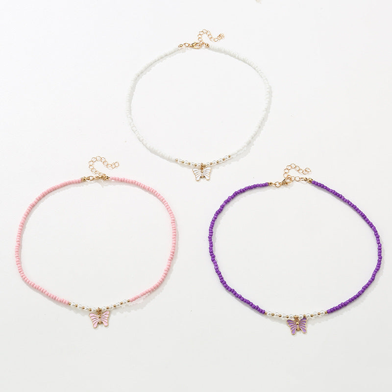 Collana con Ciondolo a Farfalla Smaltata in Stile Bohemien con Perle di Vetro per Bambini, Catenina con Perline Rotonde Fatta a Mano