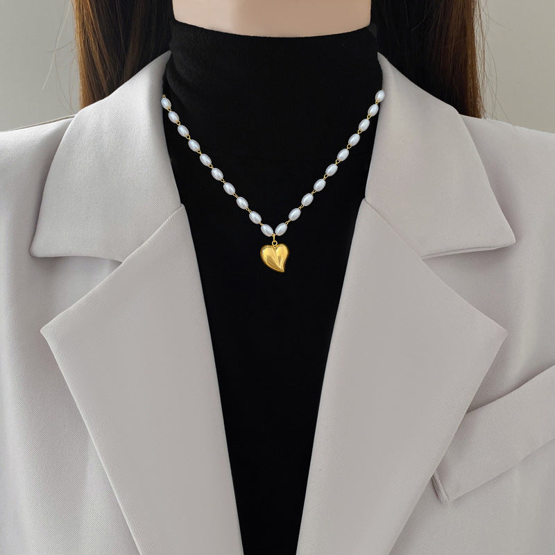 Collar con Colgante Geométrico de Corazón de Acero y Titanio Minimalista con Acento Floral