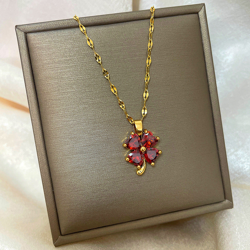 Collana con ciondolo a goccia in rame placcato oro 18 carati con micro-pavé e catena a onda in acciaio al titanio, design originale