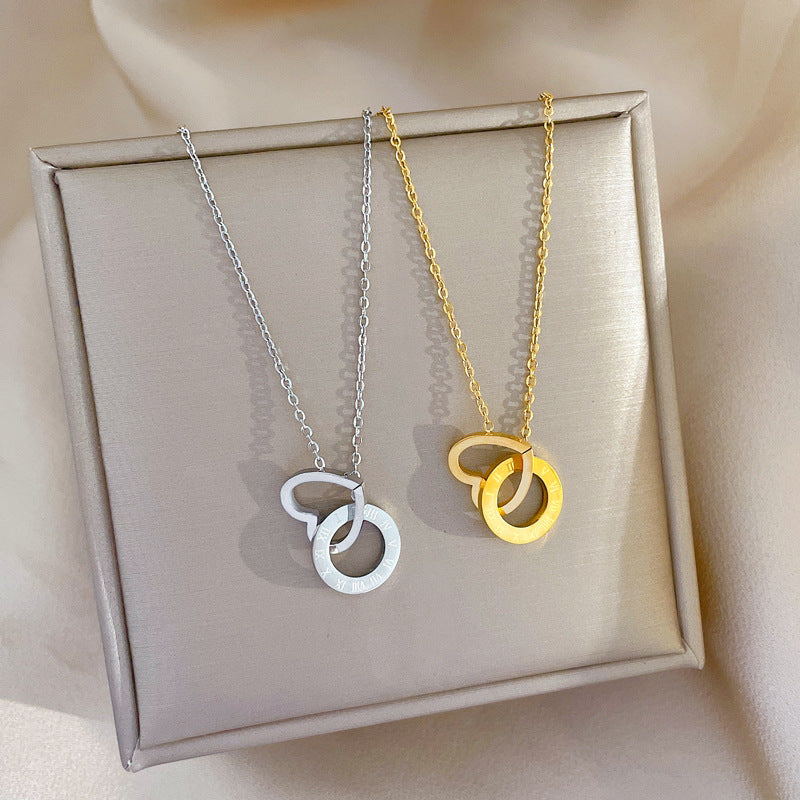 Collar minimalista chapado en acero de titanio con forma de corazón para mujer con colgante geométrico y delicada cadena de clavícula