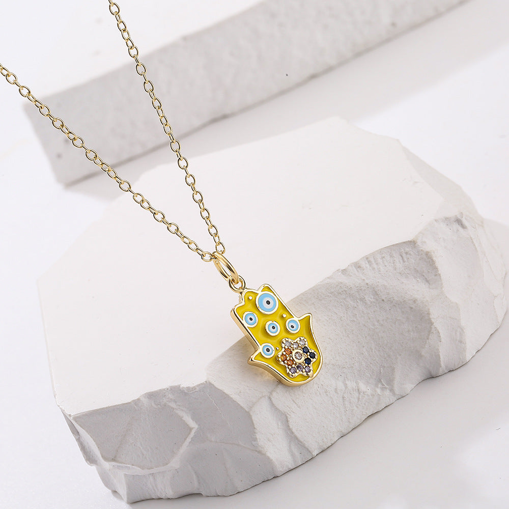 Minimalist Geometric Fatima Hand Pendant Necklace for Women in Copper with 18K Gold Plating and Enamel Finish Featuring Cubic Zirconia Accents