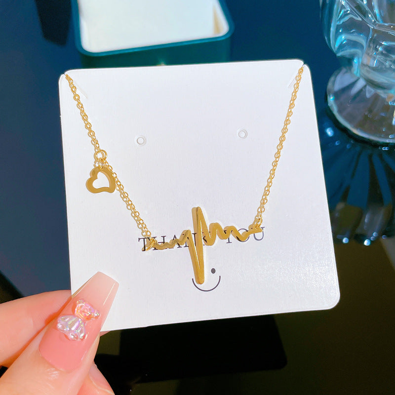 Collana da donna a forma di cuore con elettrocardiogramma geometrico minimalista in acciaio al titanio, placcata oro con design a catena per clavicola