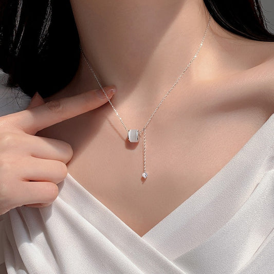 Minimalist Waist-Shaped Cross Necklace in Titanium Steel with Electroplated Gold Finish for Women