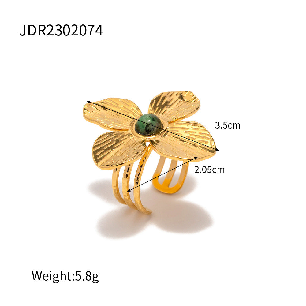 Anello appariscente con fiore a quattro petali, stile palazzo francese, finitura opaca, intarsio in turchese africano, fascia regolabile aperta, design di gioielli elegante da donna