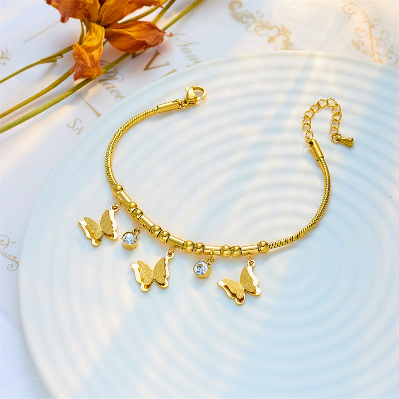 Bracciale Minimalista in Acciaio al Titanio a Forma di Farfalla con Intarsio di Strass da Donna
