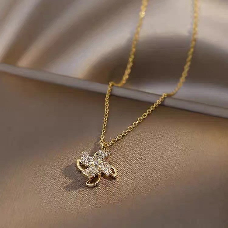 Rotatable Windmill Pendant Necklace for Women Geometric Titanium Steel Plated Locket Chain with Bow Detail Summer Lightweight Fashion Accessory