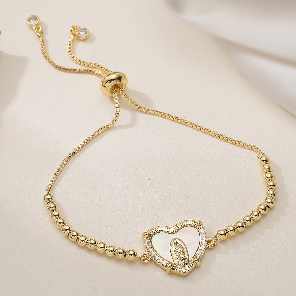 Gold Plated Brass Heart Bracelet with Cubic Zirconia and Virgin Mary Charm for Women