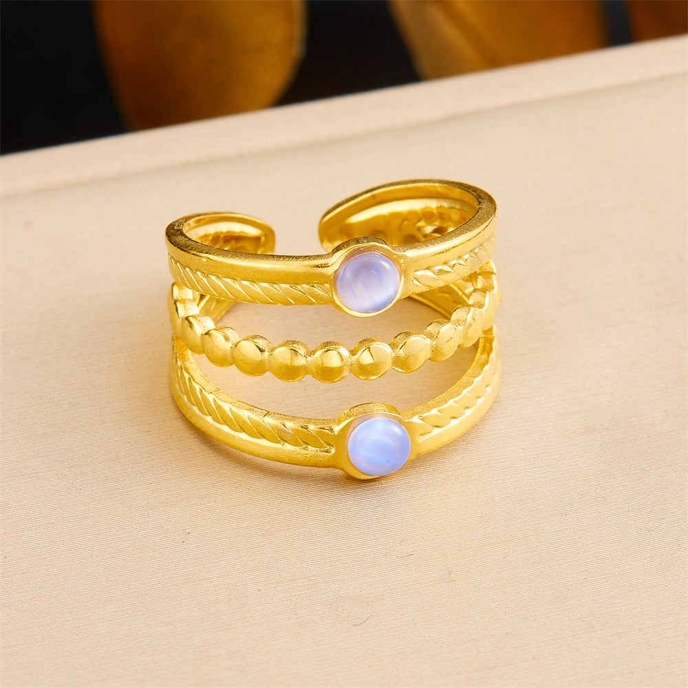 Anillo de acero inoxidable geométrico de estilo vintage con baño de oro de 18 quilates y detalle de corazón asimétrico para mujer