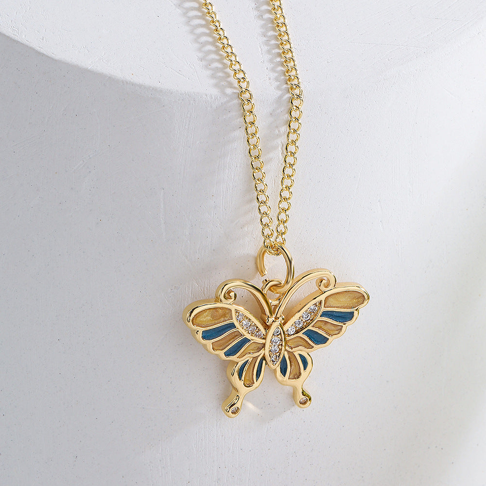 Minimalist Butterfly Pendant Necklace for Women with Copper Base Plated in 18K Gold and Enamel Finish Featuring Cubic Zirconia Accents