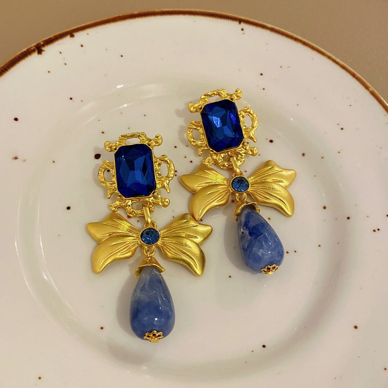 Pendientes de Ángel Retro Artísticos Ovalados con Incrustaciones de Pedrería para Mujer con Base de Cobre y Diseño Geométrico
