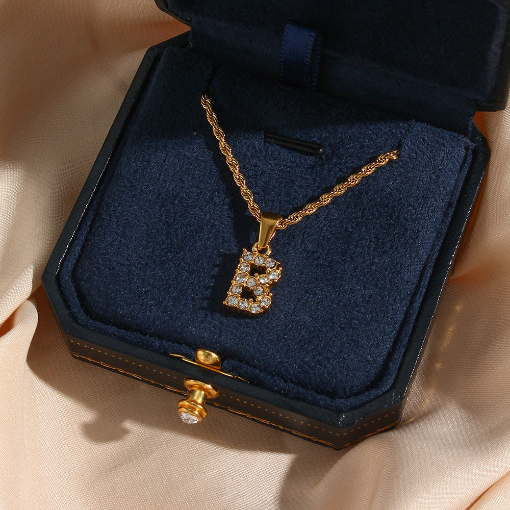 Collana da donna minimalista con pendente a lettera in stile Ins, catena in acciaio inossidabile e pendente in acciaio al titanio placcato