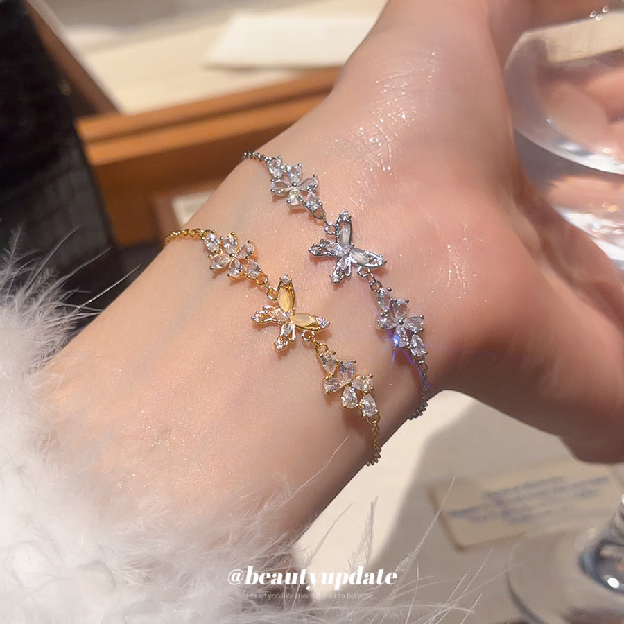Bracciale da donna placcato oro 18 carati con zirconi a forma di farfalla in stile lusso