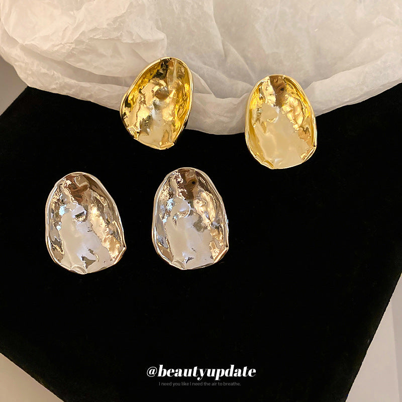 Orecchini a perno da donna minimalisti con forma geometrica irregolare, in metallo e perni in argento 925