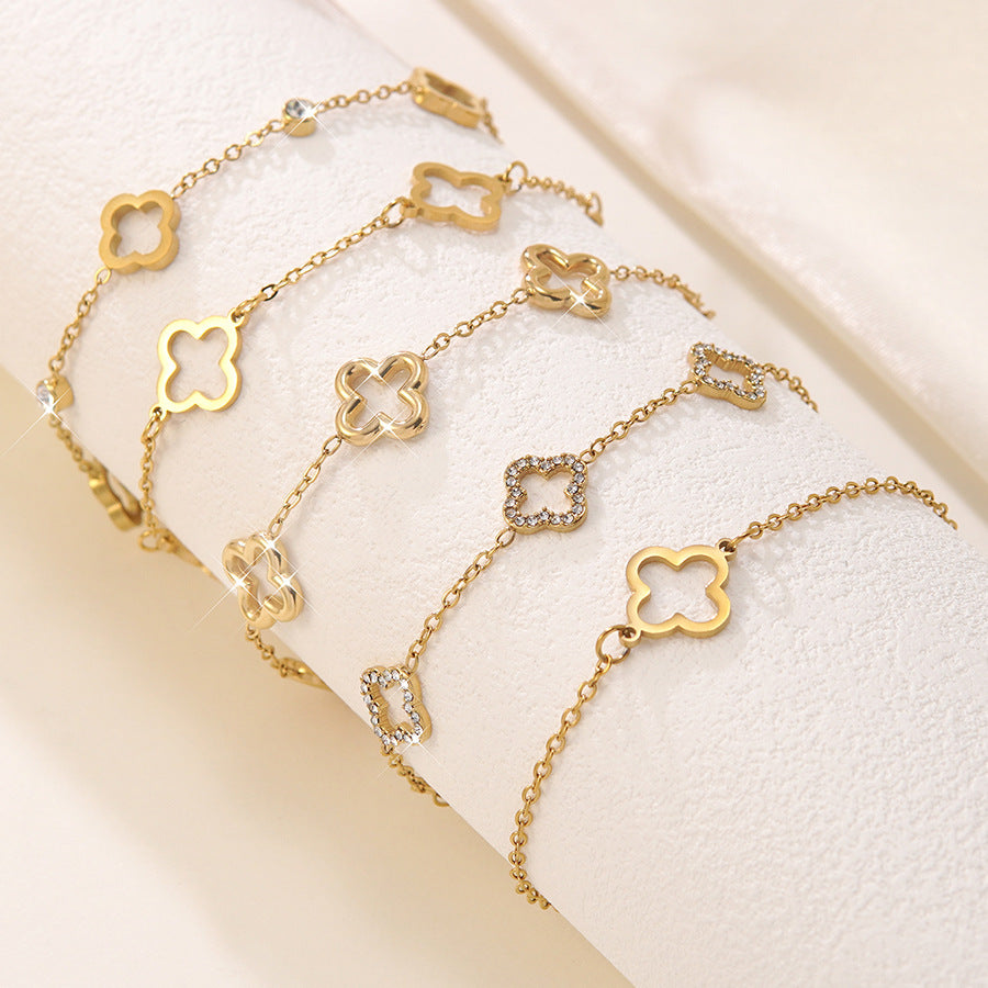 Elegante Bracciale Minimalista da Donna in Acciaio Inossidabile Placcato Oro con Zirconi e Quadrifoglio