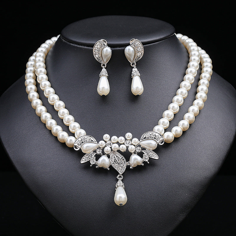 Set di collana e orecchini floreali ispirati a Chanel per donna con lega placcata oro, catena di perline e motivi botanici tra cui grano, petali, foglie e silhouette di alberi