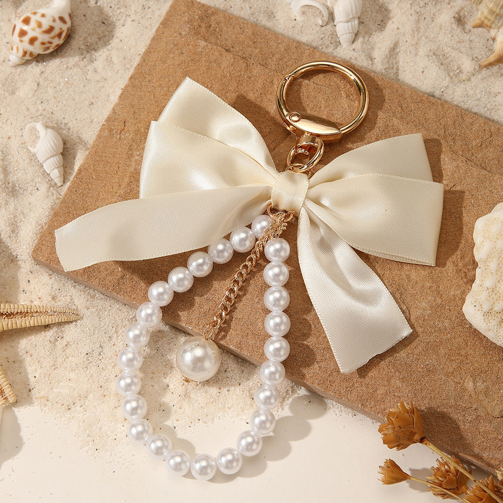 Sweet Cartoon Bow Pearl Zinc Alloy Keychain Bag Charm