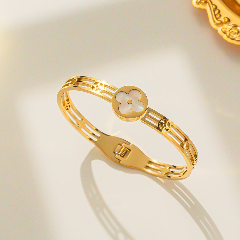 Luxury Style Four-Leaf Clover Shaped Titanium Steel Bracelet with Hollow-Out Design and White Shell Inlay for Women